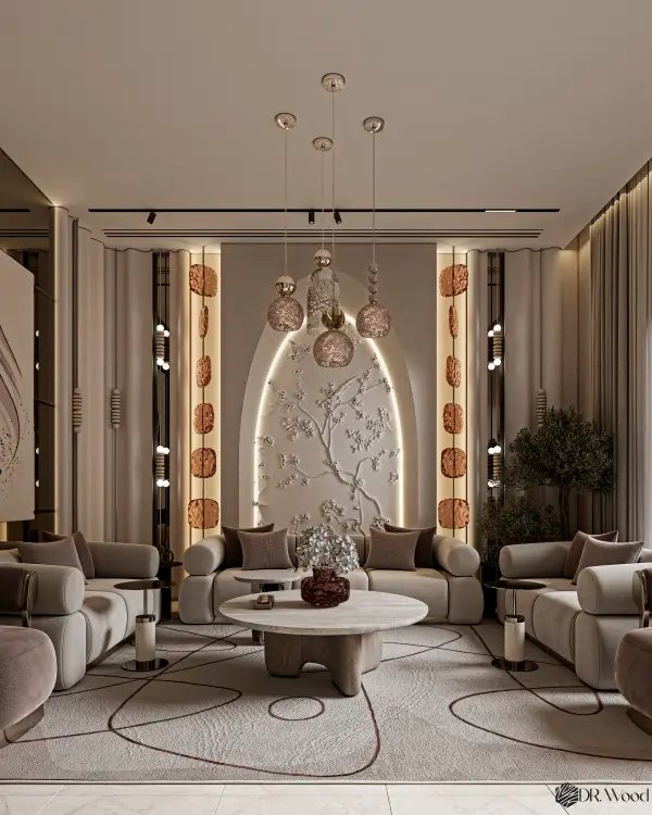 Elegant contemporary majlis interior with curved seating, neutral tones, sculptural lighting, and a textured illuminated feature wall creating a warm luxurious ambiance